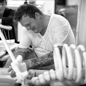 A portrait photograph of Urs Fischer