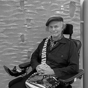 A portrait of Ashley Bickerton