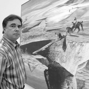 A portrait photograph of Mark Tansey