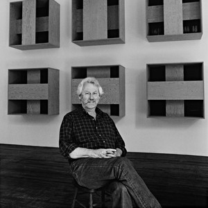A portrait photograph of Donald Judd