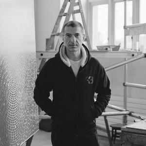 A portrait photograph of Y.Z. Kami