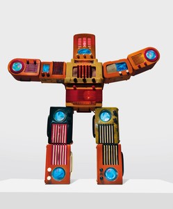 Nam June Paik, Bakelite Robot, 2002. Single-channel video (color, silent) with LCD monitors, colored electric lights, and vintage Bakelite radios, 48 × 50 × 7 ¾ inches (121.9 × 127 × 19.7 cm) © Nam June Paik Estate
