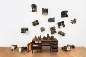 Nam June Paik, 359 Canal Street, 1991. Desk with wood blocks from George Maciunas demolition, acrylic, television chassis, newspaper clippings, piano key, and letters (authors include Yoko Ono, Ray Johnson, and Wolf Vostell), dimensions variable © Nam June Paik Estate